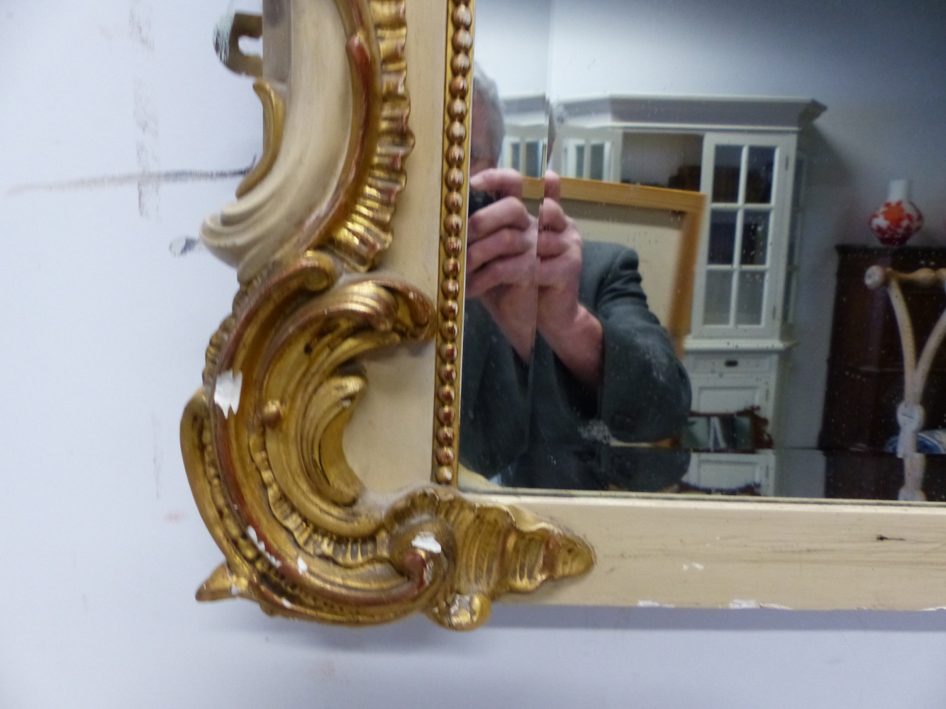 AN ANTIQUE FRENCH PAINTED AND GILT OVERMANTLE /PIER MIRROR. SHAPED BEVELLED PLATE. 180 x 110cms. - Image 4 of 5
