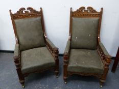 AN IMPRESSIVE PAIR OF CARVED OAK LATE VICTORIAN GENTLEMAN'S LIBRARY ARMCHAIRS. GREEN NAIL STUDDED