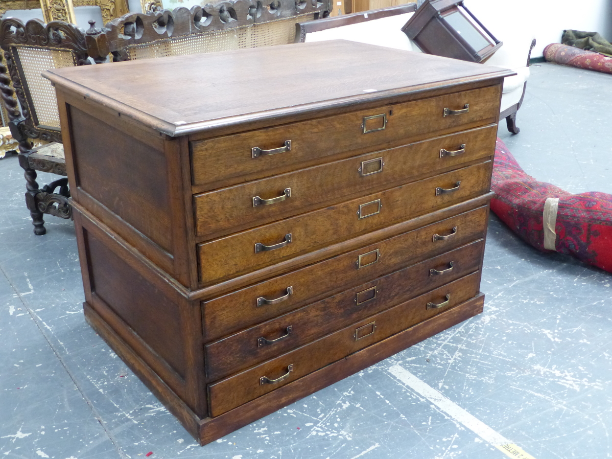 A VINTAGE OAK CHART OR PLAN CHEST OF TWO HALVES EACH WITH THREE LONG DRAWERS, THE BASE HALF WITH - Image 2 of 2