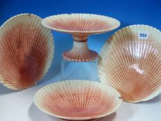 TWO PAIRS OF SARREGUEMINES SCALLOP SHELL COMPORTS, A COALPORT MUG, A GLASS DOME. H 9cms. AN ILLUSION