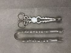 A PAIR OF EARLY SILVER SUGAR TONGS, AND A FURTHER PAIR OF SILVER QUEEN ANNE STYLE WITH MAKERS MARK