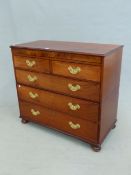 A VICTORIAN MAHOGANY CHEST IN TWO HALVES WITH TWO SHORT AND THREE LONG DRAWERS, EACH OF THE BRASS