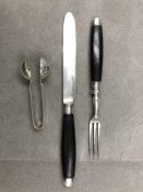 A KNIFE AND FORK PAIR OF EBONY HANDLED HALLMARKED SILVER DESSERT CUTLERY, TOGETHER WITH A SILVER