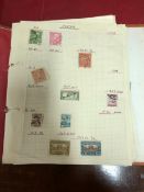 FOUR VARIOUSLY FILLED ALBUMS OF BRITISH AND WORLD STAMPS