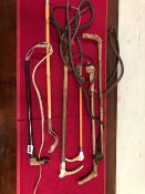 THREE SWAINE ADENEY HUNTING CROPS AND THREE OTHERS WITH VARIOUS METAL MOUNTS TO INCLUDE THREE WITH