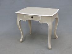 A FRENCH COUNTRY STYLE PAINTED SIDE TABLE. WITH APRON DRAWER.