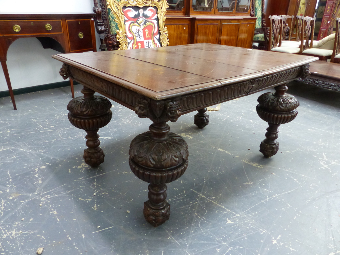 A FRENCH OAK DINING TABLE ON MASSIVE CUP AND COVER LEGS, EXTENDING BUT WITHOUT LEAVES. W 134 x D 100