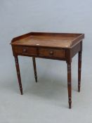 A 19th C. MAHOGANY WASHSTAND, THE THREE QUARTER GALLERIED TOP ABOVE TWO DRAWERS AND RING TURNED