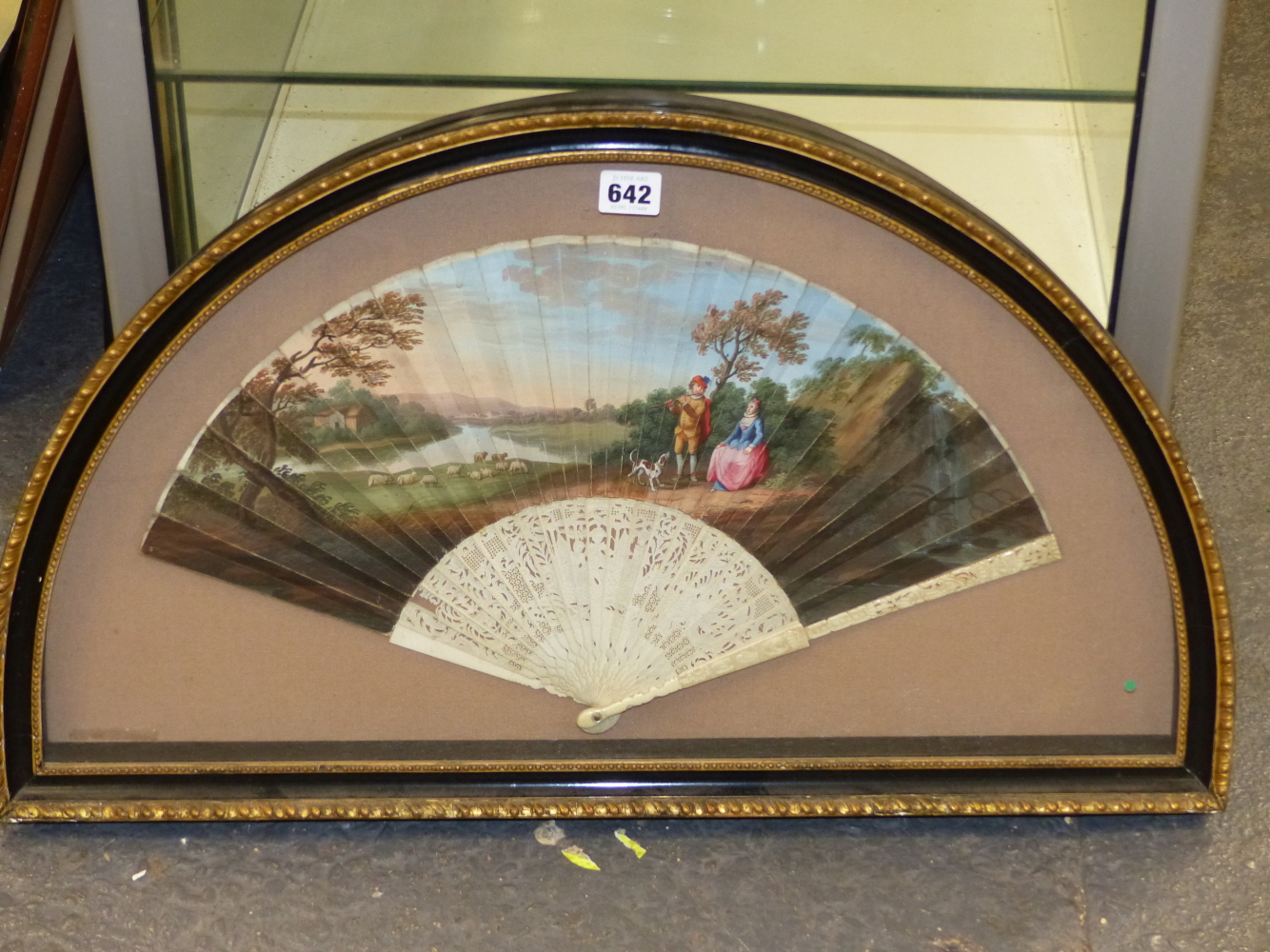 A FRAMED FAN WITH THE LEAF PAINTED WITH A FLAUTIST ENTERTAINING A LADY SEATED BEFORE SHEEP GRAZING - Image 2 of 7