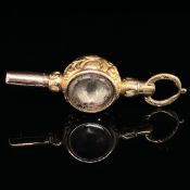 AN ANTIQUE DOUBLE SIDED GILDED POCKET WATCH KEY WITH AN ORNATE CARVED SHANK AND SUSPENSION LOOP. SET