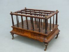 A BURR WALNUT THREE COMPARTMENT CANTERBURY, THE BAIZE LINED DRAWER WITH THE FRONT DOWNSWEPT TO