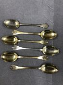 A SET OF SIX GILDED SILVER TREFID TEASPOONS, EACH ENGRAVED WITH DATES 1913-1915. 69grms.