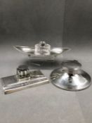 A HALLMARKED SILVER GLASS INKWELL AND WEIGHTED STAND, DATED 1913 BIRMINGHAM FOR SYNYER & BEDDOES,