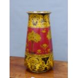 A DOULTON TUDOR PATTERN VASE WITH BIRDS BETWEEN FRUITING PALMS ON A RED GROUND, OCHRE BANDS ABOVE