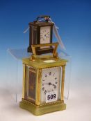 A MINIATURE CARRIAGE TIMEPIECE. H 7.5cms. TOGETHER WITH A GLAZED ONYX AND BRASS CARRIAGE