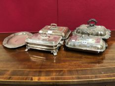 FOUR VARIOUS OLD SHEFFIELD PLATE VEGETABLE TUREENS AND COVERS TOGETHER WITH AN OVAL DISH. W 35.