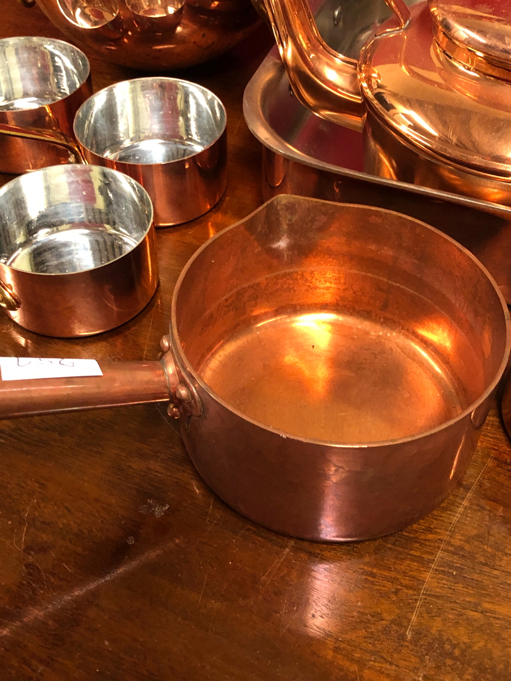 A COLLECTION OF 10 COPPER SAUCEPANS. Dia. 9.5cms. TWO LARGER COPPER SAUCEPANS, A TWO HANDLED - Image 8 of 9