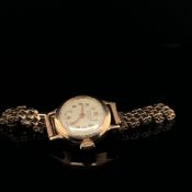 A 9ct GOLD J.W.BENSON, LONDON, LADIES WRIST WATCH. MANUAL WOULD, WITH CHAMPAGNE DIAL. COMPLETE