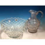 A 19th C. CUT GLASS BALUSTER JUG. H 26cms. TOGETHER WITH A MONTEITH PUNCH BOWL, THE EXTERIOR CUT