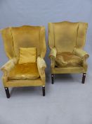 A PAIR OF GOLDEN VELVET UPHOLSTERED GEORGIAN STYLE WING ARMCHAIRS ON SQUARE SECTIONED MAHOGANY LEGS