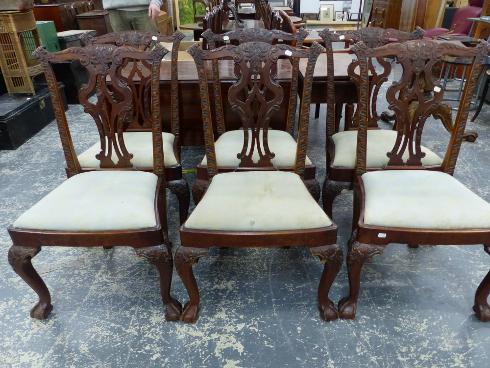 A SET OF SIX GOOD 18th.C. STYLE MAHOGANY DINING CHAIRS WITH PIERCED CARVED BACKS OVER CABRIOLE FORE