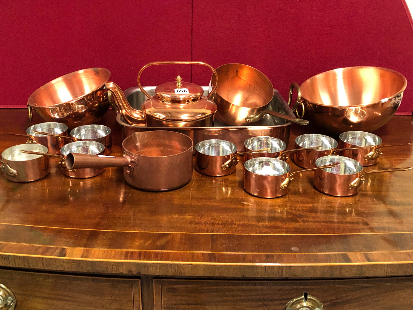 A COLLECTION OF 10 COPPER SAUCEPANS. Dia. 9.5cms. TWO LARGER COPPER SAUCEPANS, A TWO HANDLED