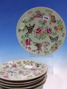 SIX 19th C. CANTON CELADON GROUND PLATES PAINTED WITH BUTTERFLIES, FLOWERS AND BIRDS. Dia. 25.5cms.