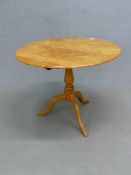 A SATIN BIRCH ROUND 19th CENTURY COUNTRY TILT TOP TABLE, D. 57cm.