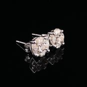 A PAIR OF 9ct WHITE GOLD DIAMOND FLOWER CLUSTER STUD EARRINGS, SET WITH MARQUISE AND BRILLIANT CUT