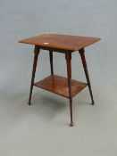ATTRIBUTED TO LIBERTYS, A MAHOGANY TWO TIER SIDE TABLE, EACH OF THE TAPERING CYLINDRICAL LEGS