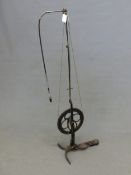 AN IRON TREADLE POWERED DENTISTS DRILL. H 149cms.