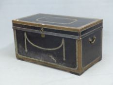 A GEORGIAN BRASS BOUND CLOSE NAILED LEATHER TEAK TRUNK. W 101 x D 57 x H 54.5cms.