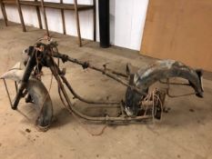 AN UNKNOWN MOTORCYCLE FRAME RETAINING SEMI ENCLOSED REAR MUDGAURD