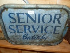 A DOUBLE SIDED SENIOR SERVICE SATISFYS WALL SIGN. 36 x 53.5cms. TOGETHER WITH AN OVAL CREAM SOLD