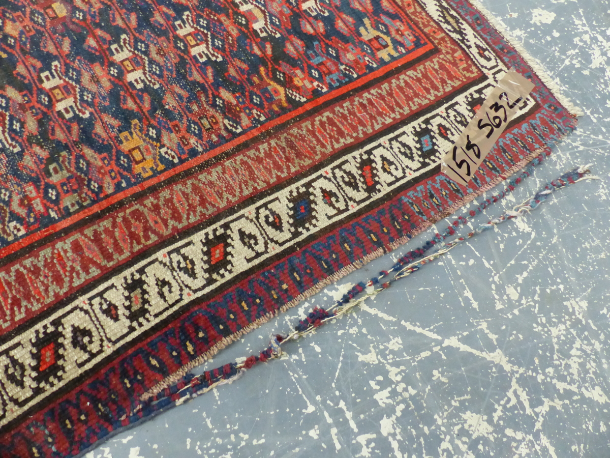 AN ANTIQUE PERSIAN TRIBAL RUNNER, 430 X 115cm. - Image 21 of 22