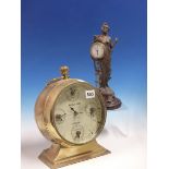 A JUNGHANS PENDULUM CLOCK SWUNG BY A SPELTER CLASSICAL LADY. H 29cms. TOGETHER WITH A BRASS CASED