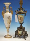 A TURQUOISE GROUND SEVRES STYLE PORCELAIN AND GILT METAL TWO HANDLED BALUSTER LAMP. H 36cms.