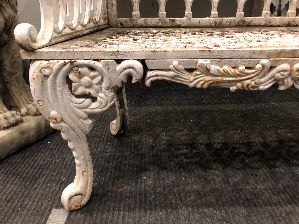 A CAST IRON GARDEN BENCH IN THE COALBROOKDALE TASTE, THE BACK WITH SERPENTINE FOLIATE TOP RAIL ABOVE - Image 8 of 10