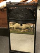 A BEVELLED GLASS RECTANGULAR MIRROR IN ARTS AND CRAFTS IRON FRAME WITH A HALF ROUND CRESTING OF