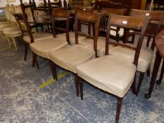 A SET OF SEVEN REGENCY MAHOGANY DINING CHAIRS, EACH WITH REEDED TOP RAILS AND HORIZONTAL BAR