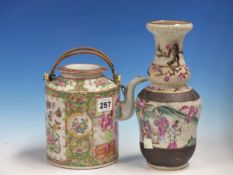 A CANTON CYLINDRICAL TEA POT AND COVER TYPICALLY PAINTED WITH ALTERNATING FIGURE AND GARDEN PANELS