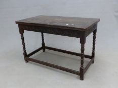 AN ANTIQUE RECTANGULAR SIDE TABLE, THE APRON CARVED WITH ROUND ARCHES, THE TRIPLE BALUSTER LEGS