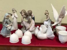 TWELVE PIECES OF LLADRO, TO INCLUDE: FOUR FIGURE GROUPS, FOUR BELLS, A PAIR OF CANDLE VASES, DOVE