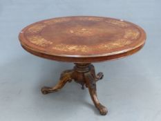 A 19th C. MARQUETRY WALNUT CIRCULAR BREAKFAST TABLE THE TOP INLAID WITH A FLORAL BAND ENCLOSING A