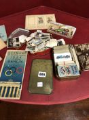 A COLLECTION OF CIGARETTE CARDS IN TWO TIN BOXES AND FOUR ALBUMS FROM THE 1930S AND LATER TOGETHER