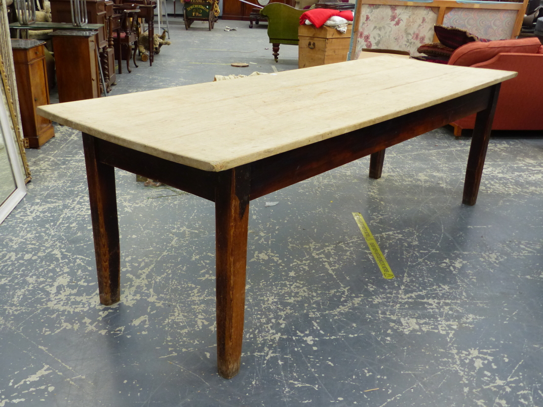 A LARGE ANTIQUE AND LATER PINE KITCHEN/SCULLERY TABLE ON SQUARE TAPERED LEGS. DIMENSIONS 244 x 82