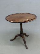 A GEORGE III MAHOGANY BIRDCAGE TRIPOD TABLE, THE TOP WITH APPLIED PIE CRUST EDGE, THE GUN BARREL