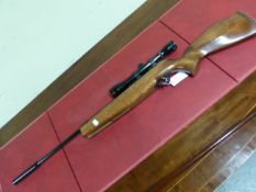A WEBLEY LONGBOW AIR RIFLE .177 CAL. FITTED WITH AND UNKNOWN 4 X 60 TELESCOPIC SIGHT