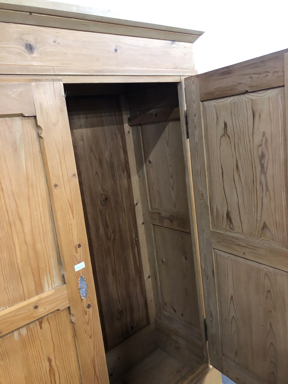 A CONTINENTAL PINE KNOCK DOWN TWO DOOR WARDROBE. W. 139 x D. 52 x H. 205cms. - Image 2 of 2