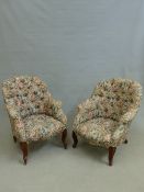 A PAIR OF CARVED WALNUT BUTTON BACK TUB FORM VICTORIAN ARMCHAIRS. H. 88 x W. 74 x D. 82cms.